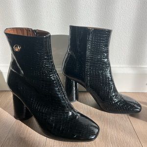 Black patent alligator pattern boots in great condition.